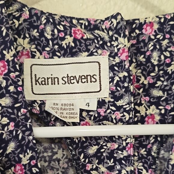 - Karin Stevens Pink and Black Jumpsuit with V-Neck and Tie Waist - Picture 2 of 9